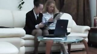 Businesswoman fucks young blonde