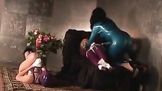 Slut in blue latex suit gagged and bound