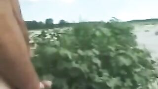 Italian lesbian couple fingering on the beach for voyeurs