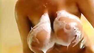 two hot women with very big tits in bathroom