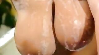 two hot women with very big tits in bathroom