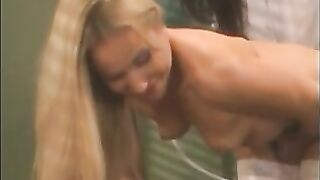 Lesbian sluts gets anal flushing and takes a shit