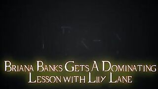 Briana Banks gets a domination lesson with Lilly Lane