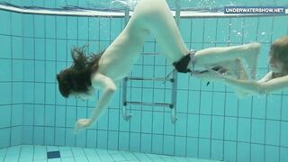 Two super hot teens in the pool