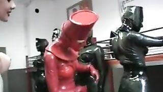 Submissive lesbian slut anal inflatation in latex black body