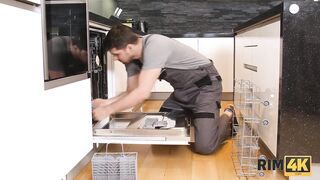 RIM4K. Gal interrupts repairer and begins licking his butt by the dishwasher
