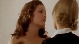 Sarah Parker as a maid prepares bath for Lila Baumann