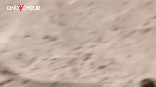 Beach Voyeur. Youthful nudist pair enjoying sex on the beach