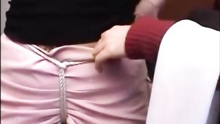 Michelle Dawson tied up by two girls