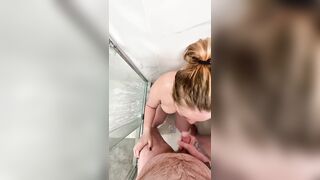 Hawt girlfriend jerks and sucks my cock until I cum on her large moist bazookas in the shower 4K POV