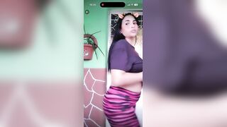 Overweight gal twerks and moves her large booty a lot