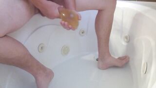 Pissing into cock-sock then Cumming hard into the piddle felt astonishing