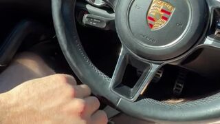 Wanking in public parking lot. Cum on Porsche steering wheel.