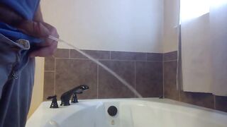 Pissing in Bathtub