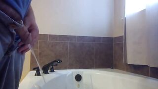 Pissing in Bathtub