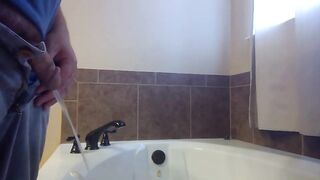 Pissing in Bathtub