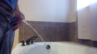 Pissing in Bathtub