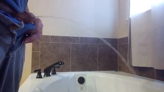 Pissing in Bathtub