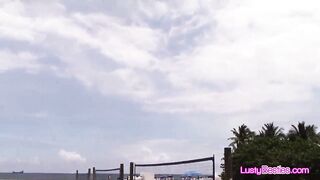 Bikini girlfriends having enjoyment on the sun on a public beach then in a intimate pool