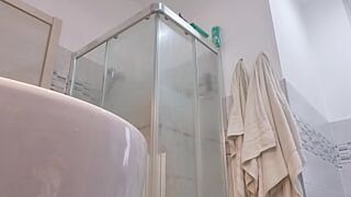 Concupiscent blond shows her boobs in the washroom stall