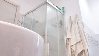 Concupiscent blond shows her boobs in the washroom stall