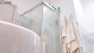 Concupiscent blond shows her boobs in the washroom stall