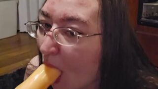 Brunette hair big beautiful woman works on some mouth training