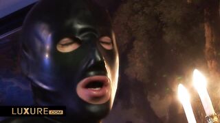 Defrancesca Gallardo is surrounded by three hooded boys