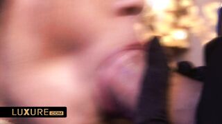 Defrancesca Gallardo is surrounded by three hooded boys