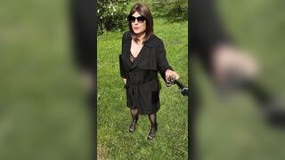 In ebony underware in the garden