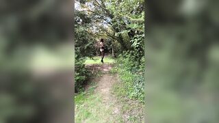 In ebony underware in the garden