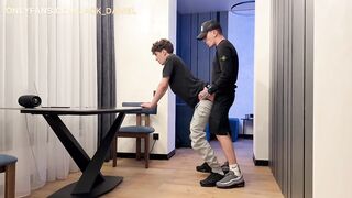 2 boys have a hard screw