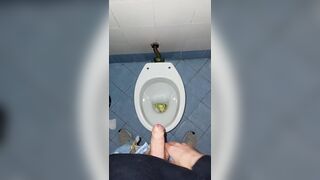 a youthful stud went into a messy public throne-room to pee and stroke