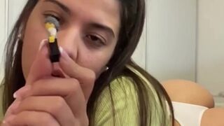 Cute giantess plays with her small toys