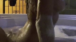 We begin in the jacuzzi and this babe ends up putting it in her butt by herself