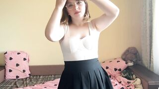 Hawt brunette hair squeezes her large boobs.