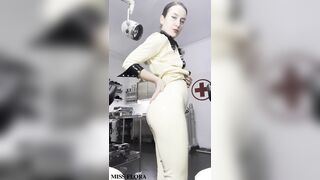 Medical Headmistress Teases u in Taut White Latex Outfit