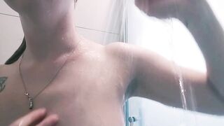 Natural blond shows off armpits in shower