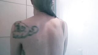 Natural blond shows off armpits in shower