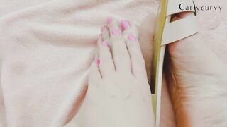 Blond licks her own toe with feet play!