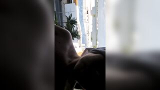 Large breasts on window