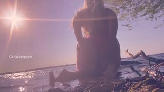 Bikini ass teasing in the water at a public beach!