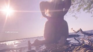 Bikini ass teasing in the water at a public beach!