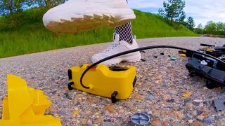 Large excavator is destroyed kicked, trampled, crushed, smashed, crushed, broken plastic car, crush