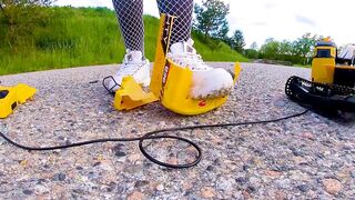 Large excavator is destroyed kicked, trampled, crushed, smashed, crushed, broken plastic car, crush