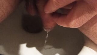 I pee and wank my dickhead.