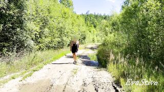hot golden-haired pissing in a puddle on the road