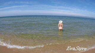 In nature's garb mama bathing bare in the sea