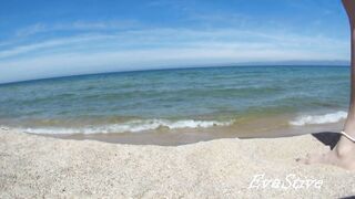 In nature's garb mama bathing bare in the sea