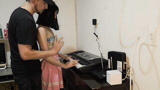 Marvelous youthful woman in pink petticoat screwed up wanting to play piano